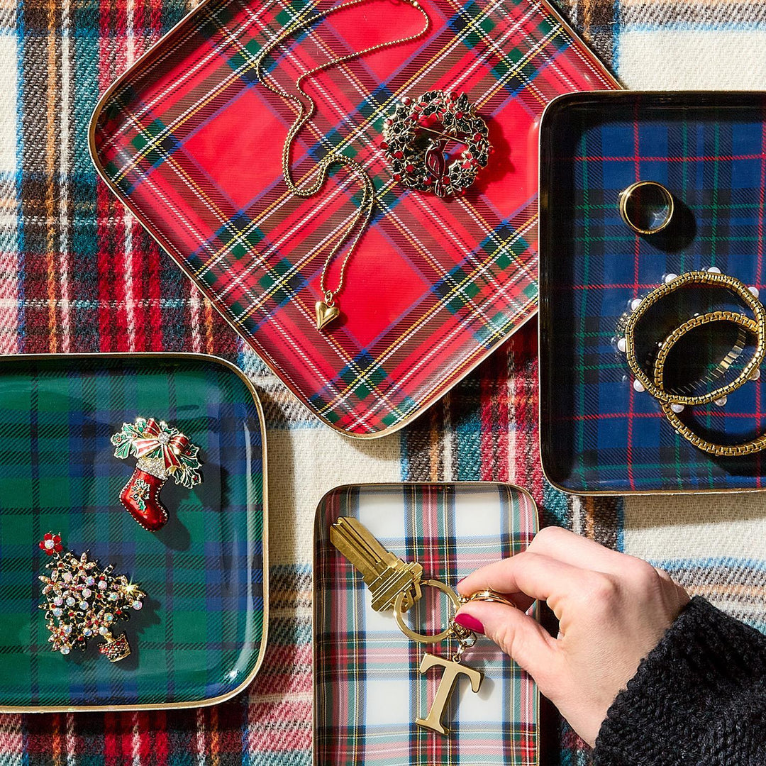 Four Tartan Metal Trays in various tartan patterns.
