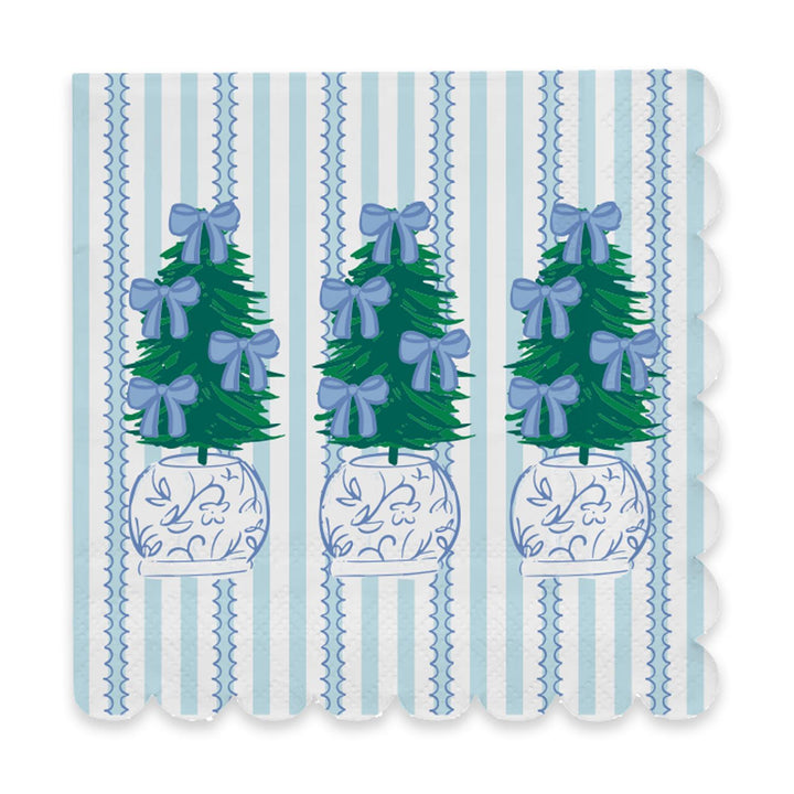 Square holiday cocktail napkins with scalloped edges, light blue vertical stripes, and a repeating potted Christmas tree print.