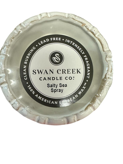 Small round white "Salty Sea Spray" soy candle by Swan Creek; clean burning, lead free, available in small fluted pot size.
