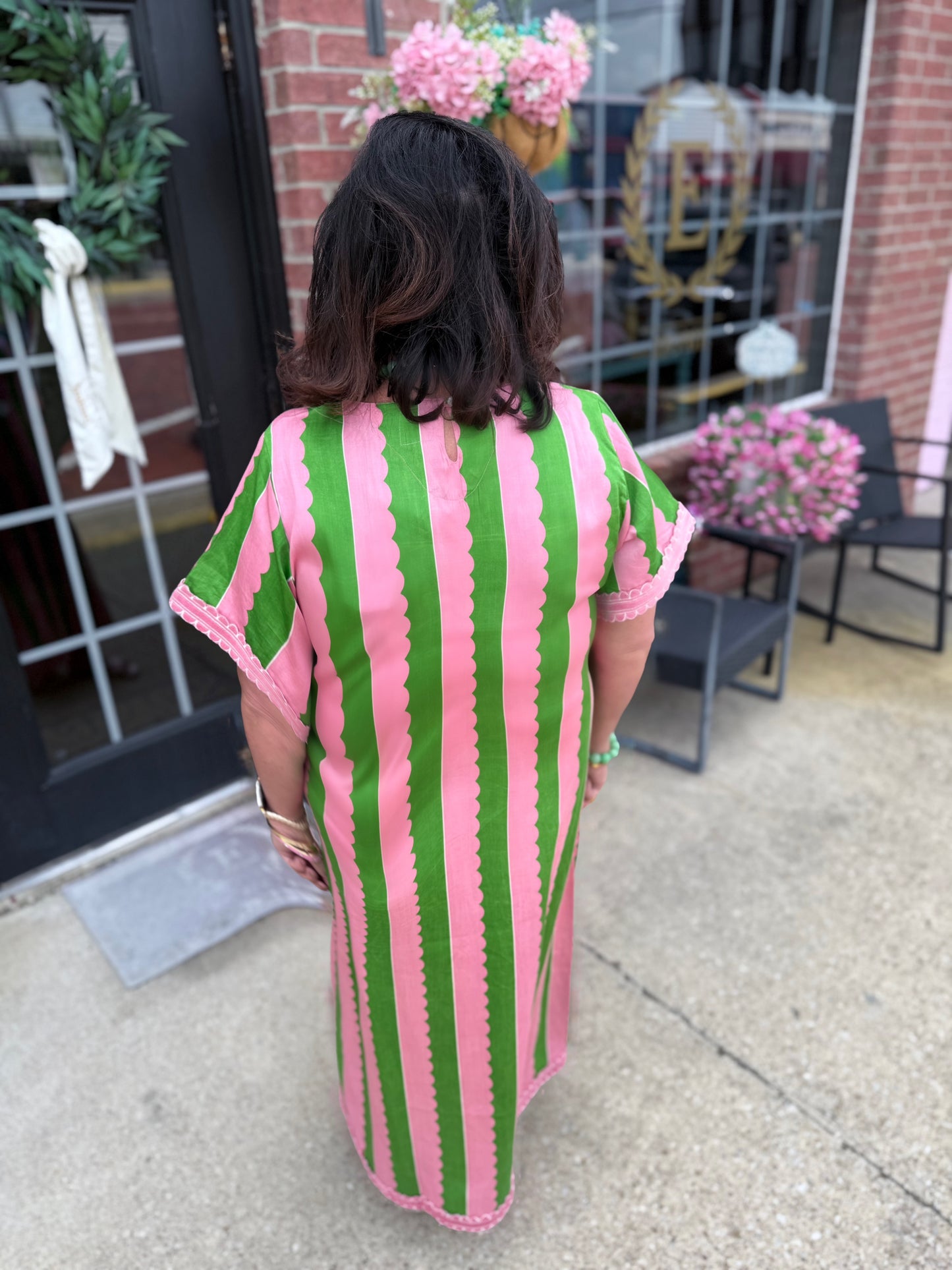 Palace Palm Marisol Caftan, a vibrant summer dress with long pink and green stripes; available in sizes XS–XL.