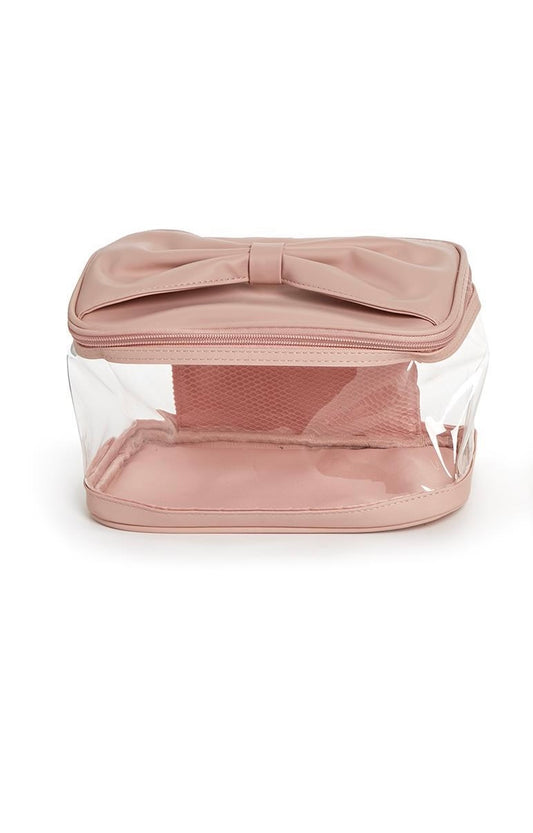 Clear plastic toiletry case with pink zipper and large bow on lid. Available in small, medium, and large sizes.