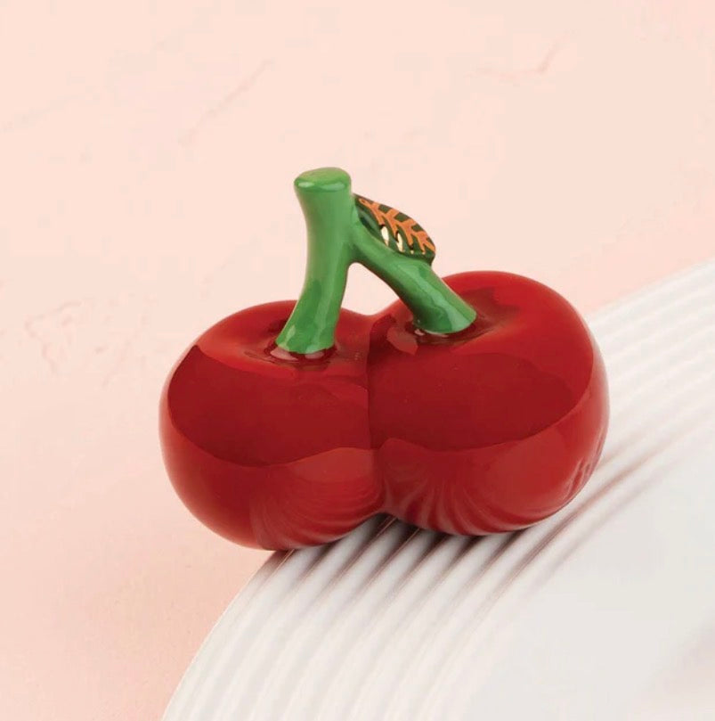 Nora Fleming Minis ceramic ornament featuring two red cherries with green stems, available in one standard size.