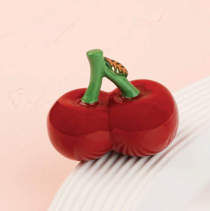 Nora Fleming Minis ceramic ornament featuring two red cherries with green stems, available in one standard size.