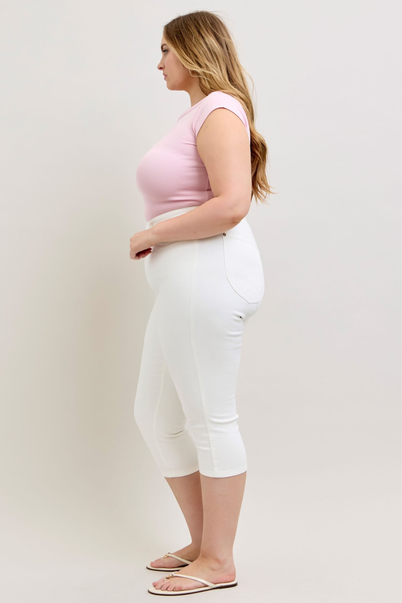 Judy Blue White Capri Jeans, available in sizes 0-20W. Classic white denim, cropped fit, slight stretch.