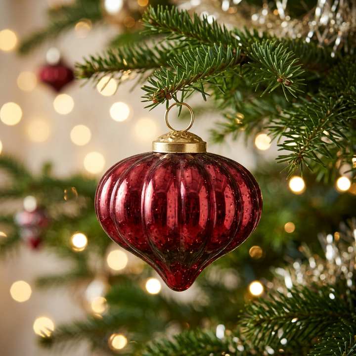 Ribbed red mercury glass teardrop ornament.