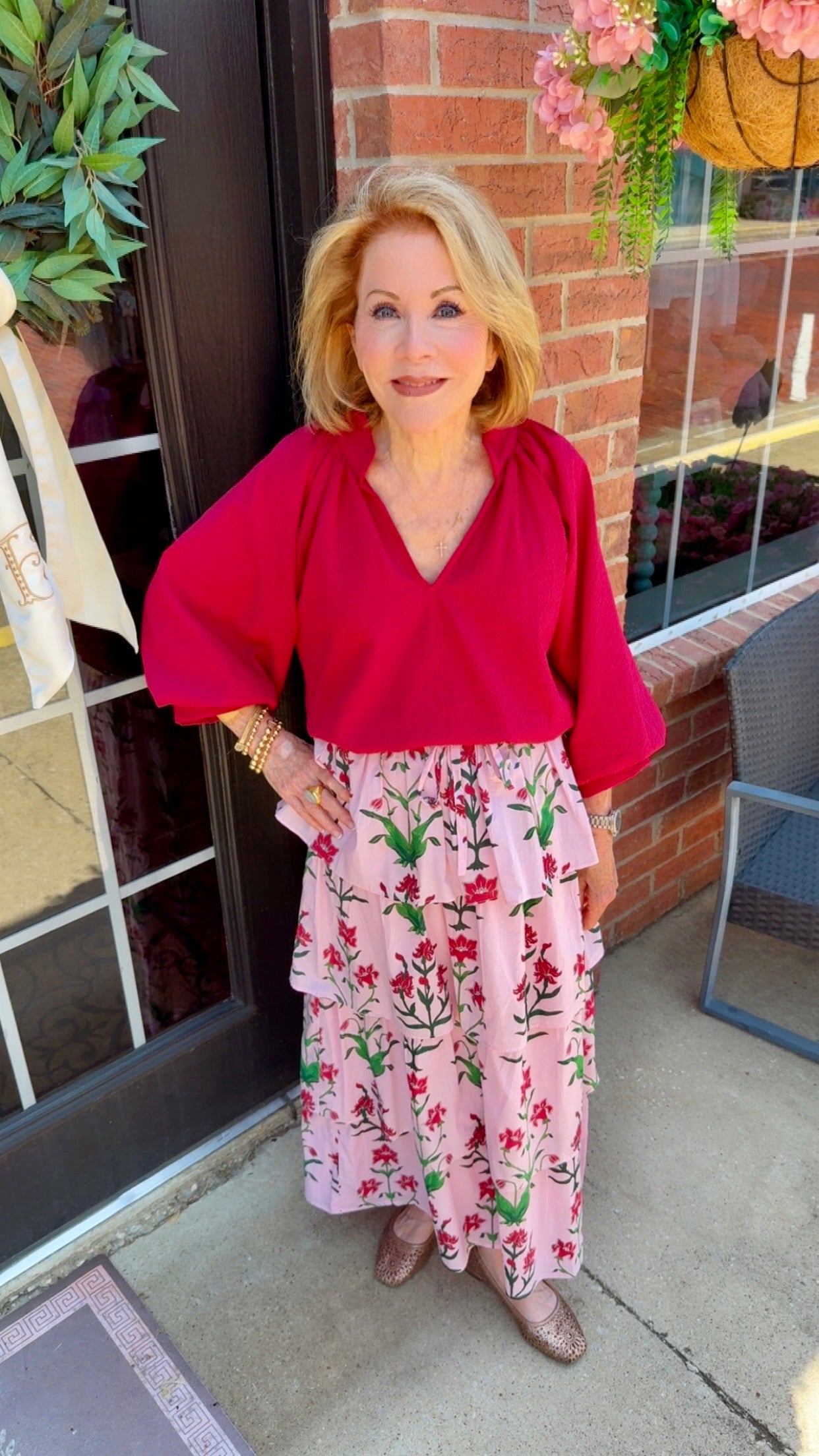 Rose d’Iris Ruffle Cascade Maxi Skirt in red, features tiered ruffles and a flowing silhouette. Available in sizes XS–XL.