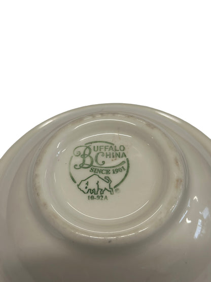 Underside of white stoneware dish stamped "Buffalo China Since 1901" in green. Size options not specified.