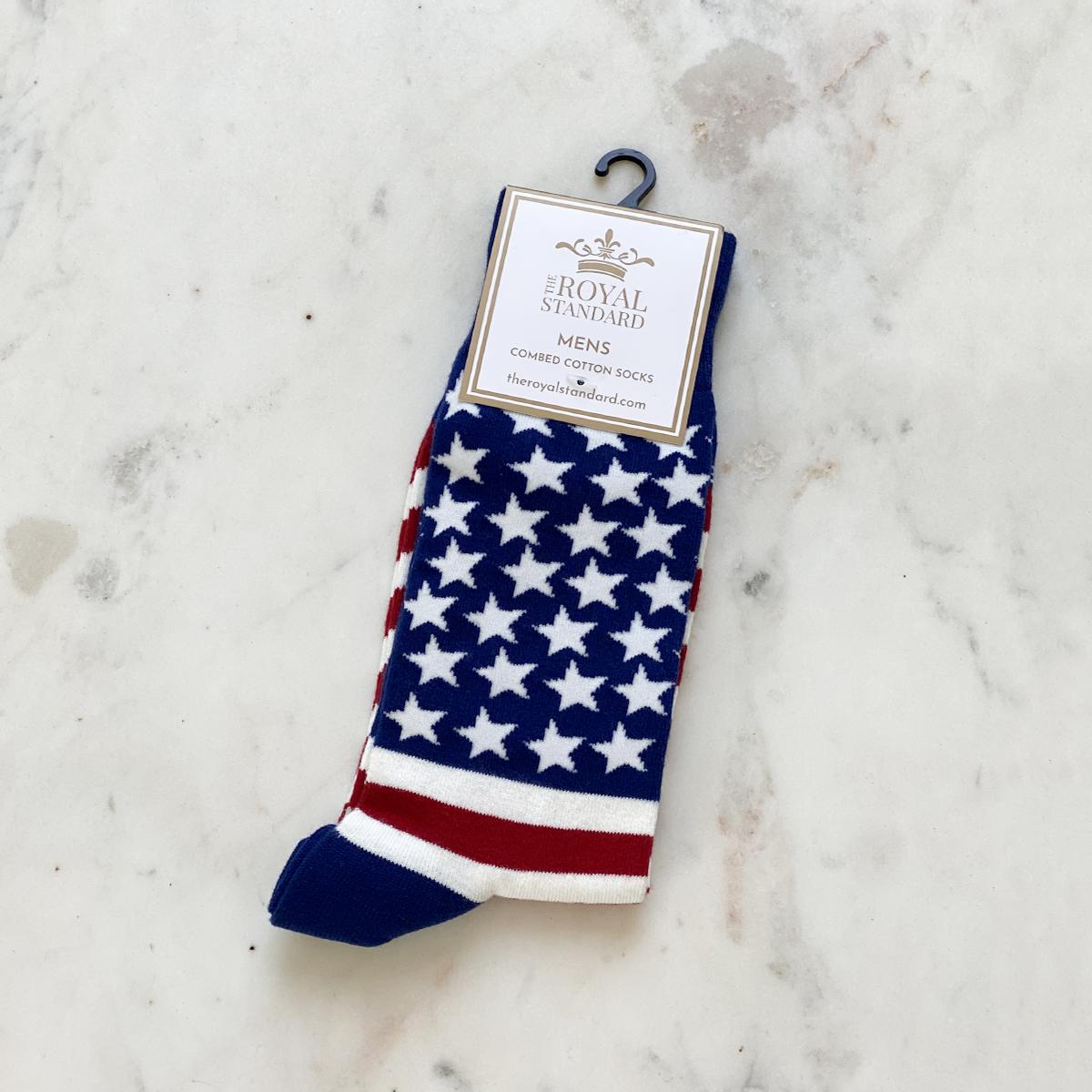 Men's socks, blue with white stars and red-white stripes. "The Royal Standard Men's Combed Cotton Socks." Sizes: available.
