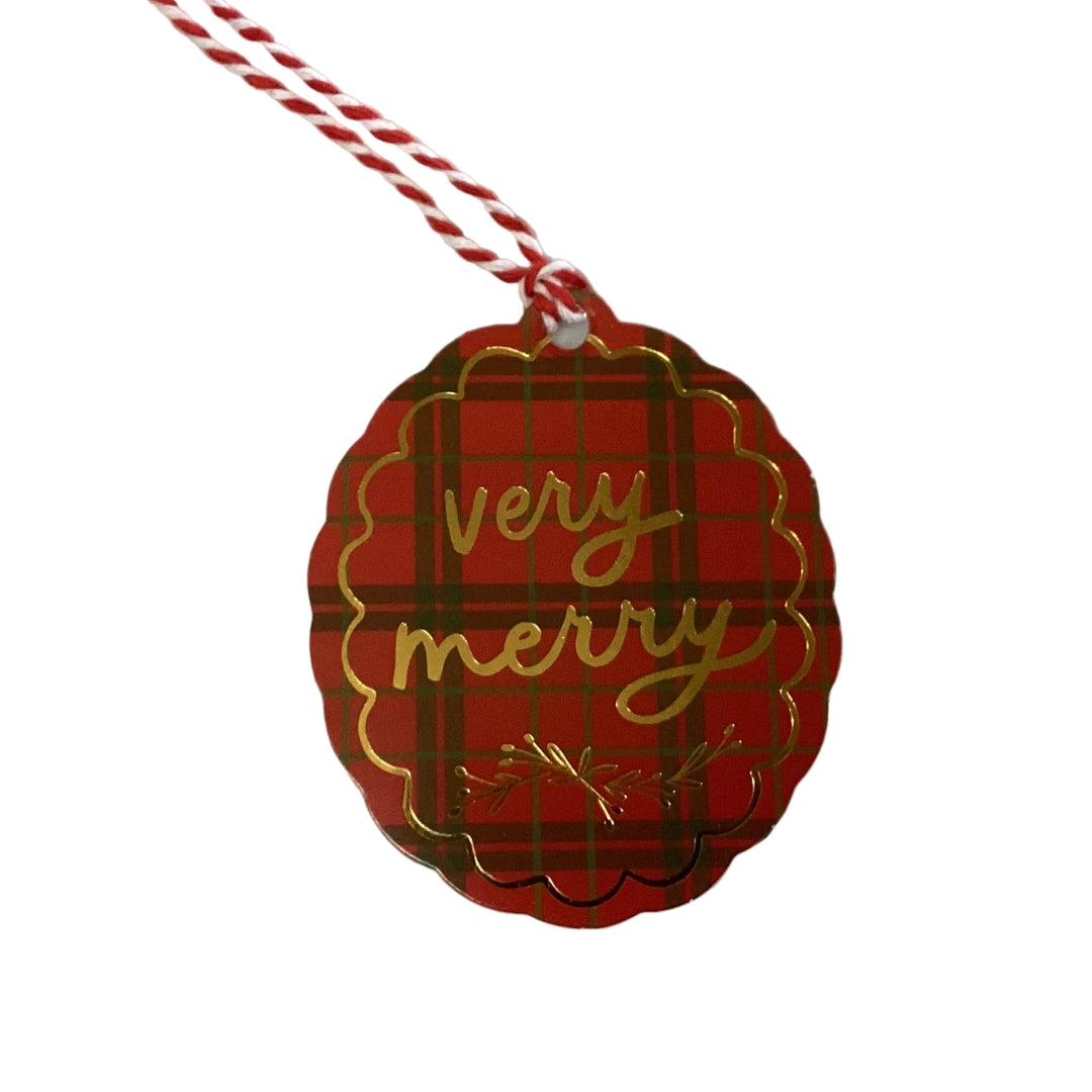 Scalloped red plaid holiday gift tag book with gold foil “very merry” text and baker’s twine.