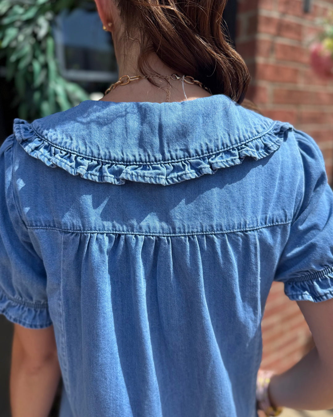 Denim Ruffle Collar Mini Dress shown; available in sizes XS-XL.