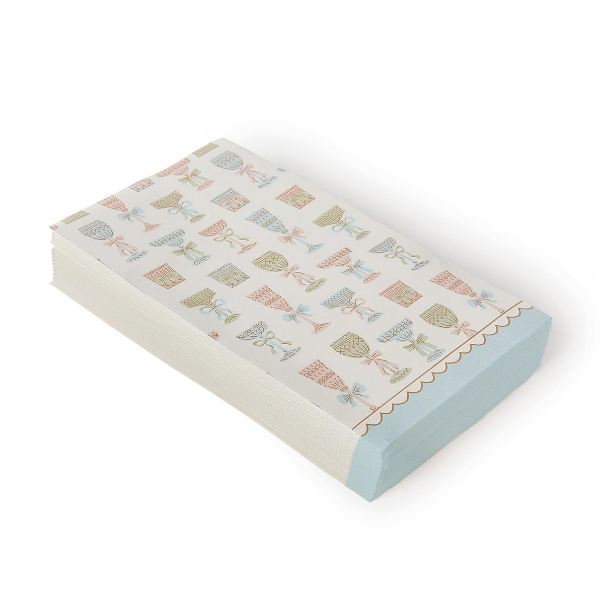 Cheers! Paper Dinner Napkin/Guest Towels in light blue with pastel teacups, teapots, and geometric patterns on the top sheet. Available in standard guest towel size.