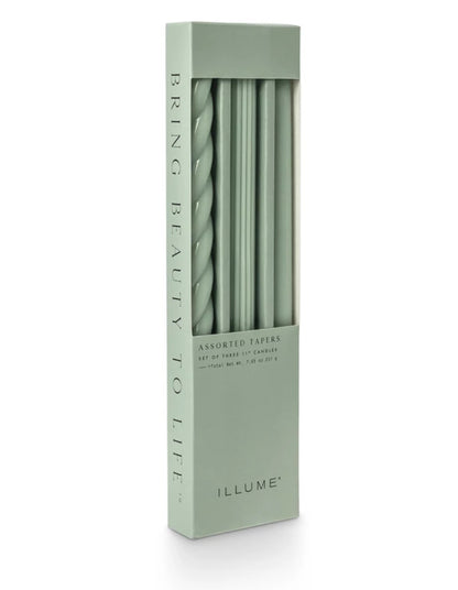 Unfragranced Assorted Candle Tapers 3 Pack: sage green straight and twisted, boxed; sizes available; "ILLUME" branding.