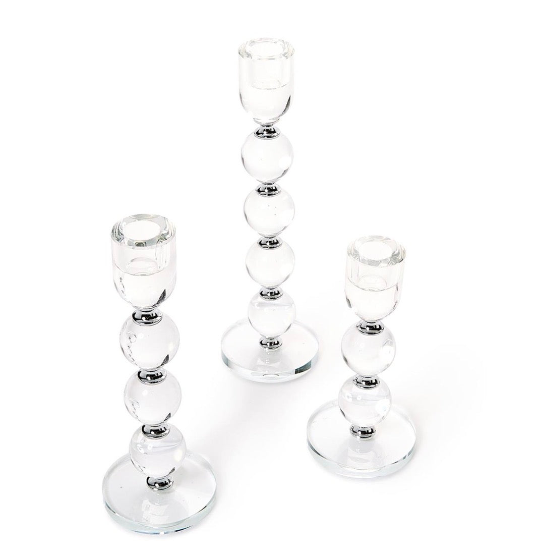 Set of three Bobbin Crystal Taper Candlesticks with stacked, round, bubble-like shapes. Available in small, medium, and large sizes.