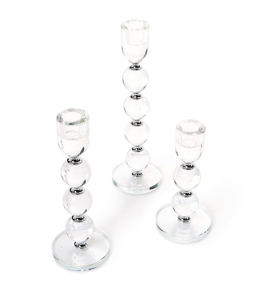 Set of three Bobbin Crystal Taper Candlesticks with stacked, round, bubble-like shapes. Available in small, medium, and large sizes.