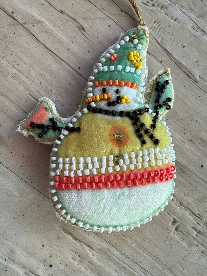 Cotton velvet snowman ornament with embroidery and glass beads.