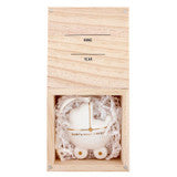 White ceramic “Baby’s First Christmas” baby carriage ornament in a wooden box with lines for name and year.