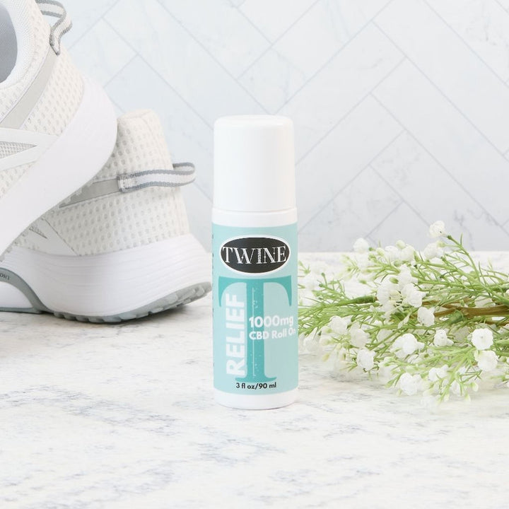 Relief Roll On bottle for muscle pain relief, available in 3 oz and 1.5 oz sizes.