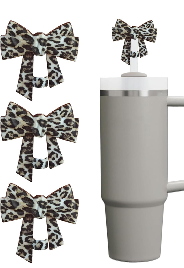 Plain gray tumbler with handle and straw, three leopard-print bows. Available in 16oz and 24oz sizes.