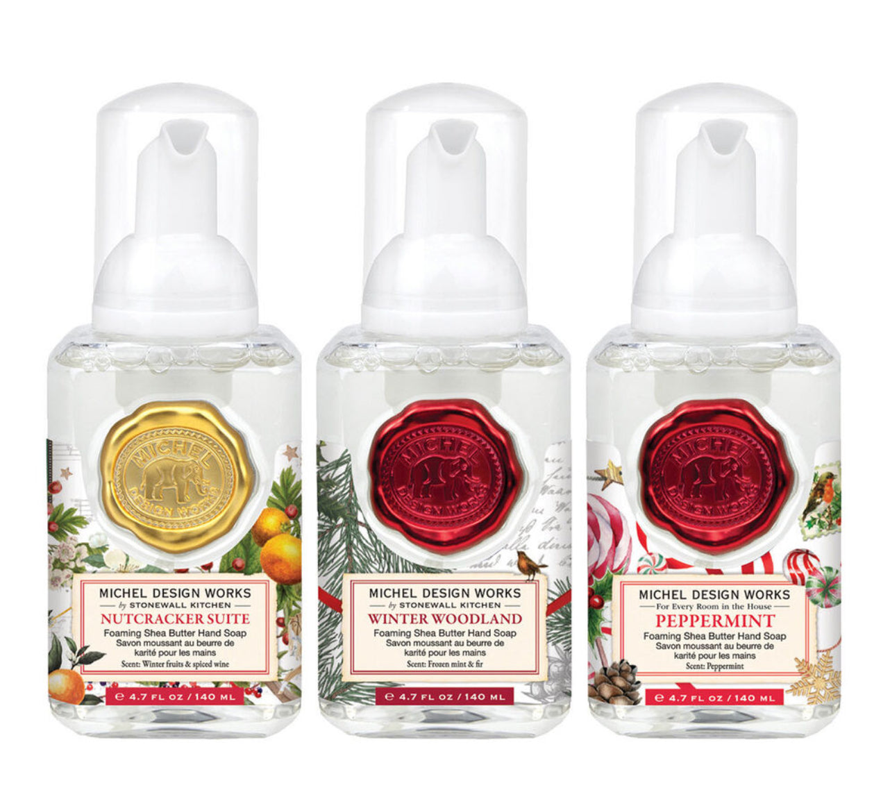 Three bottles from the Holiday Mini Foaming Hand Soap Set, adorned with festive designs. Scents: Nutcracker Suite, Winter Woodland, Peppermint. Sizes available: Mini.