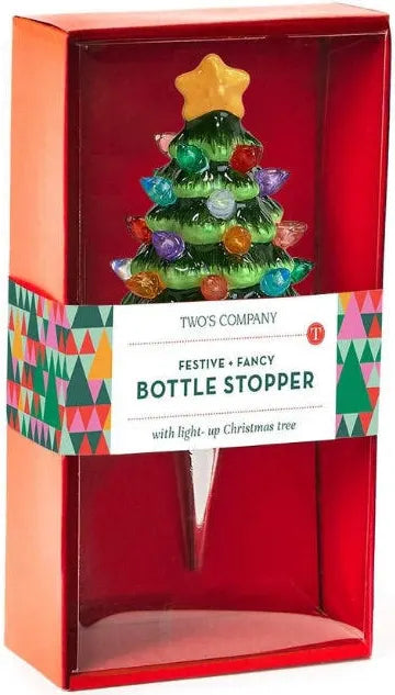Light-Up Christmas Tree bottle stopper with multicolored lights, in a red gift box.