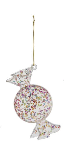 Handcrafted candy-shaped confetti glass ornament with colorful flakes and a gold string.