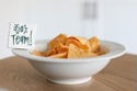 Simple Scallop Minis in a white bowl. Available sizes: small, medium, large.