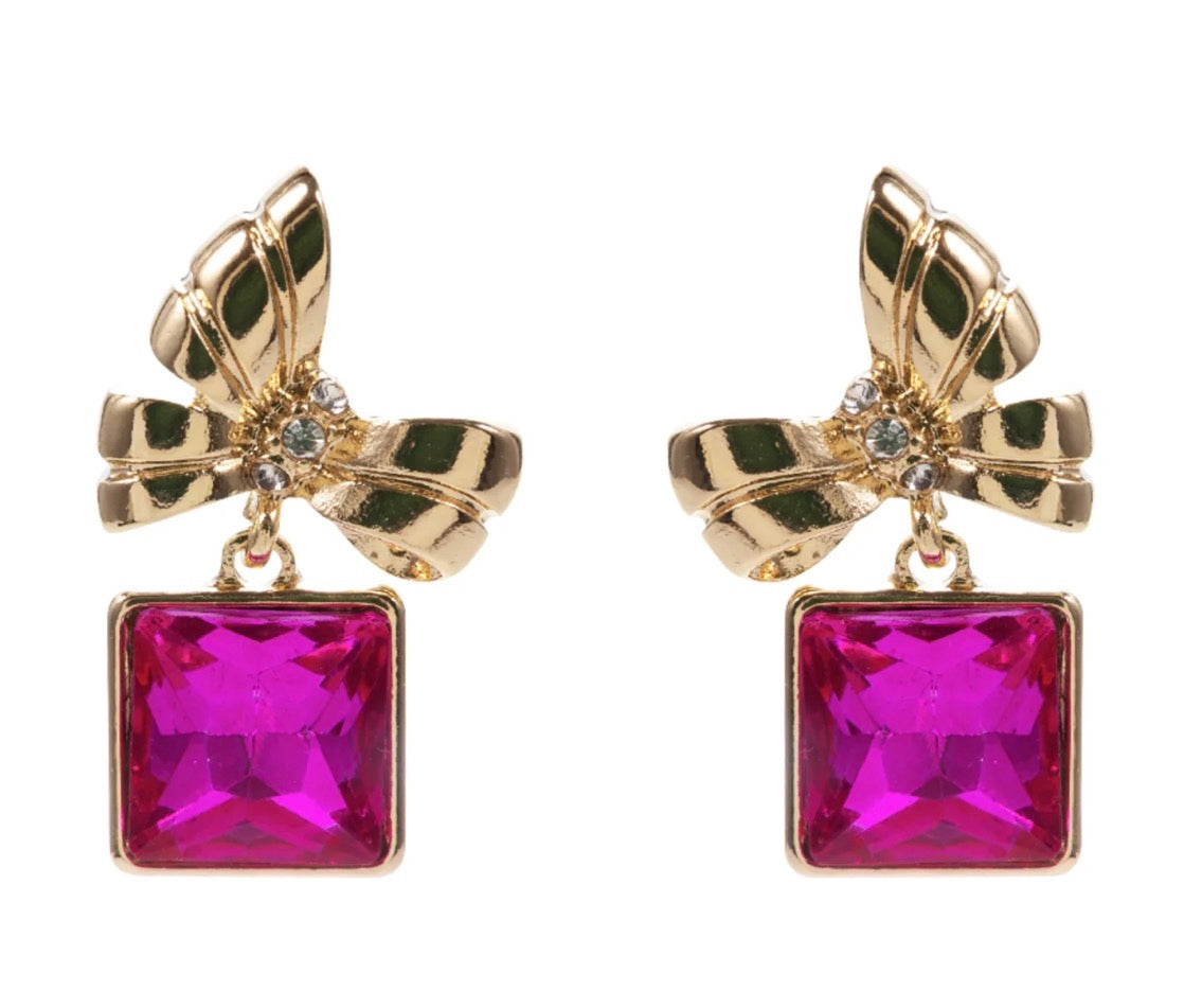 Pink Bow Dangle Earrings with bow-shaped tops, clear crystal centers, and dangling bright pink square-cut gemstones. Available in small and medium sizes.