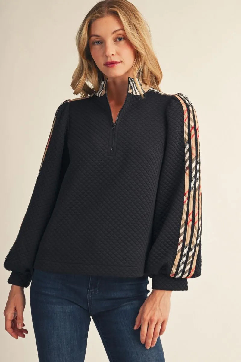Black Long Sleeved Plaid Zip Up Top with quilted design and patterned sleeve stripes; lightweight pullover available in sizes XS–XXL.