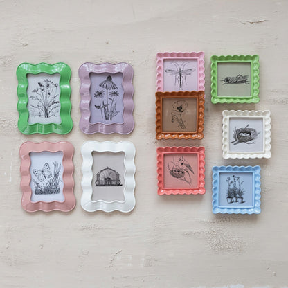 Set of nine pastel resin photo frames, wavy design, 4x6 size.