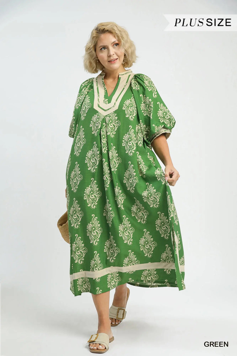 Green Abstract Print Midi Dress with short puff sleeves, flowy silhouette, and breathable fabric. Available in plus sizes.