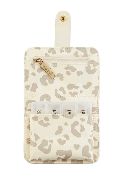 Cream pill case with beige animal print, gold zipper, zip pocket, clear pill organizer; sizes: small, medium, large.