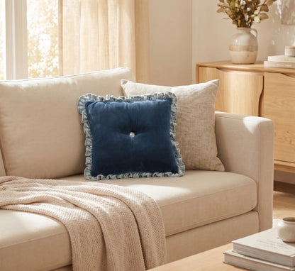 Blue Velvet Ruffle Lumbar Pillow with ruffled edges, available in 12″x20″ and 14″x26″ sizes.