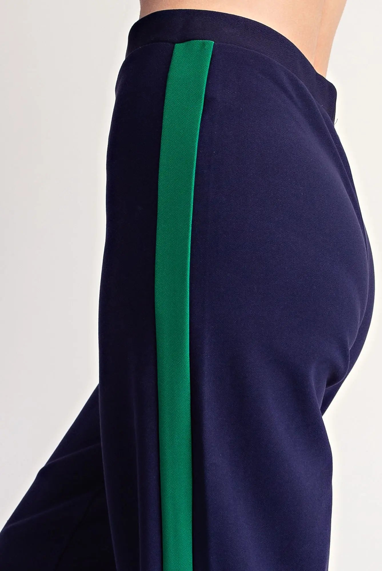 Navy blue Everyday Pull-on Contrast Pants with bold green side stripe; available in sizes XS–XL.