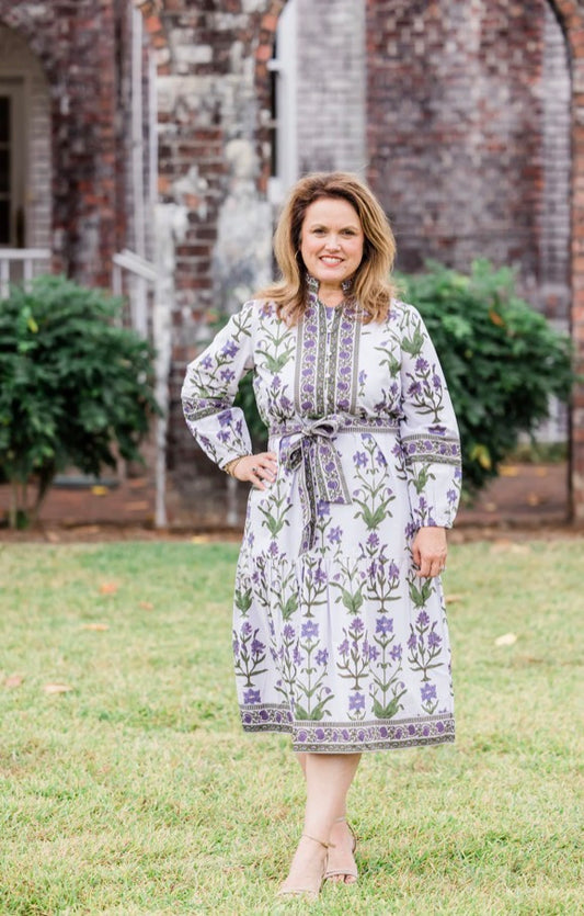 The Caroline Maxi in Iris Lavende: soft cotton poplin dress with a light purple floral hand block print, available in sizes XS–XL.