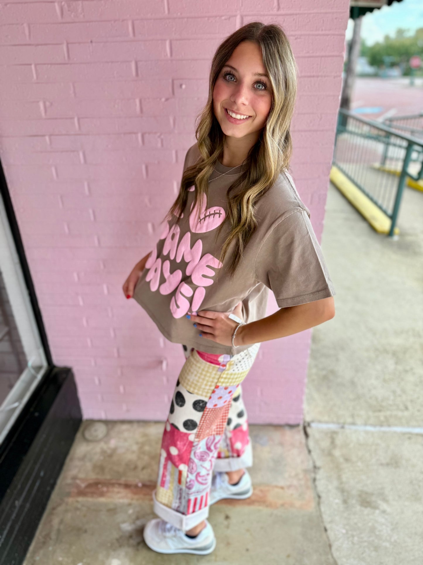 I Heart Game Day Tee with bold pink lettering. Available in sizes S-XL. Perfect for football season.