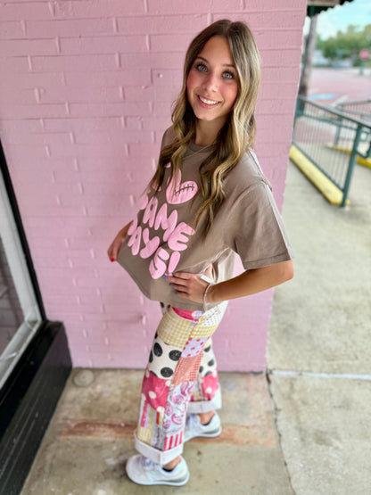 I Heart Game Day Tee with bold pink lettering. Available in sizes S-XL. Perfect for football season.