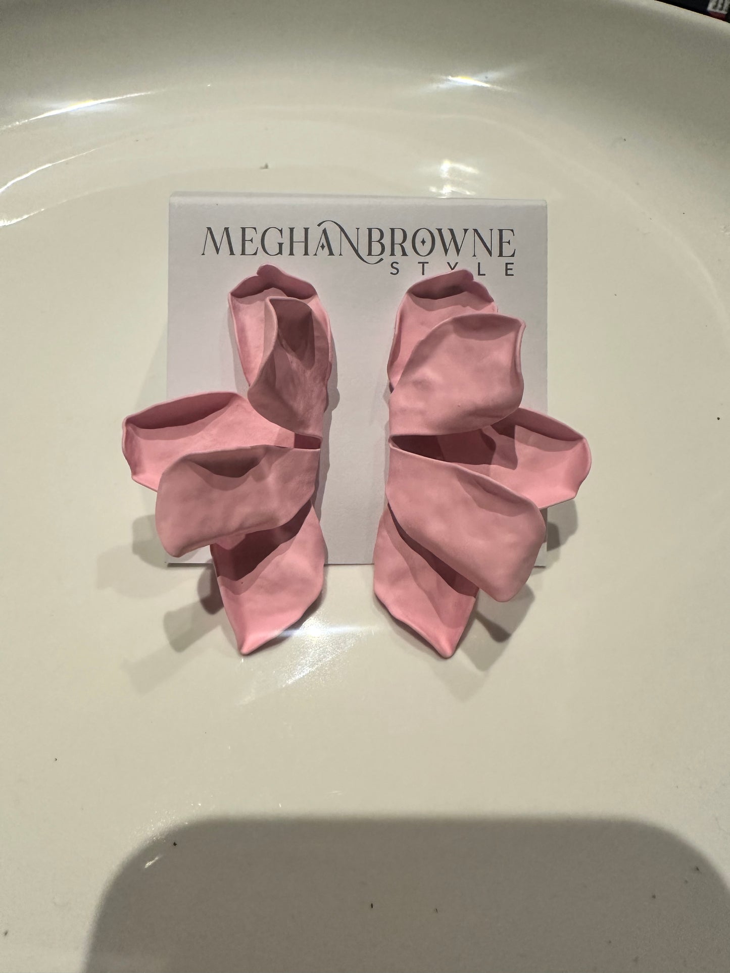 Large pink, flower-shaped statement Nellie Earrings; available in one size.
