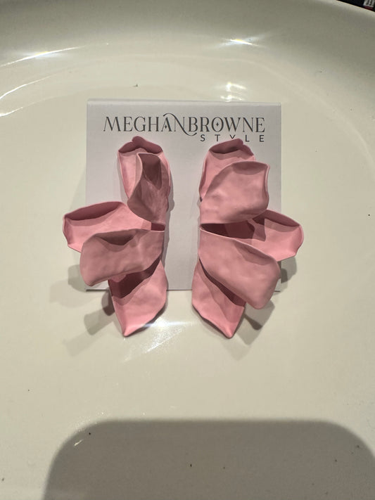 Large pink, flower-shaped statement Nellie Earrings; available in one size.