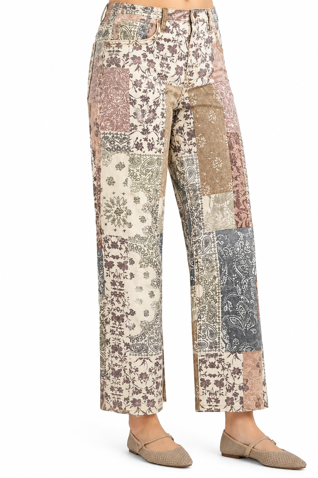 Risen high-rise, ankle-length wide jeans featuring a neutral patchwork of floral and paisley prints. Available in sizes 3/26, 5/27, 7/28, 9/29, 11/30, 13/31, 15/32.