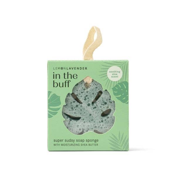 Leaf-shaped green exfoliating soap sponge with dark spots, aloe scent, shea butter. Box with window. Sizes available.