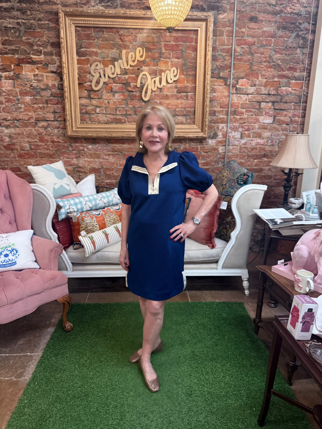 Andie Navy Dress with puff sleeves. Available in sizes XS–XL.