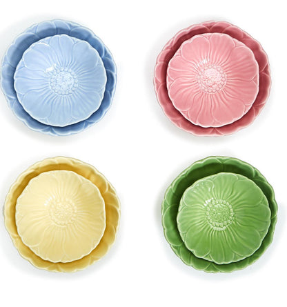 Flora Flower Accent Dishes: Ceramic flower-shaped bowls in blue, pink, yellow, green; each set includes large and small sizes.