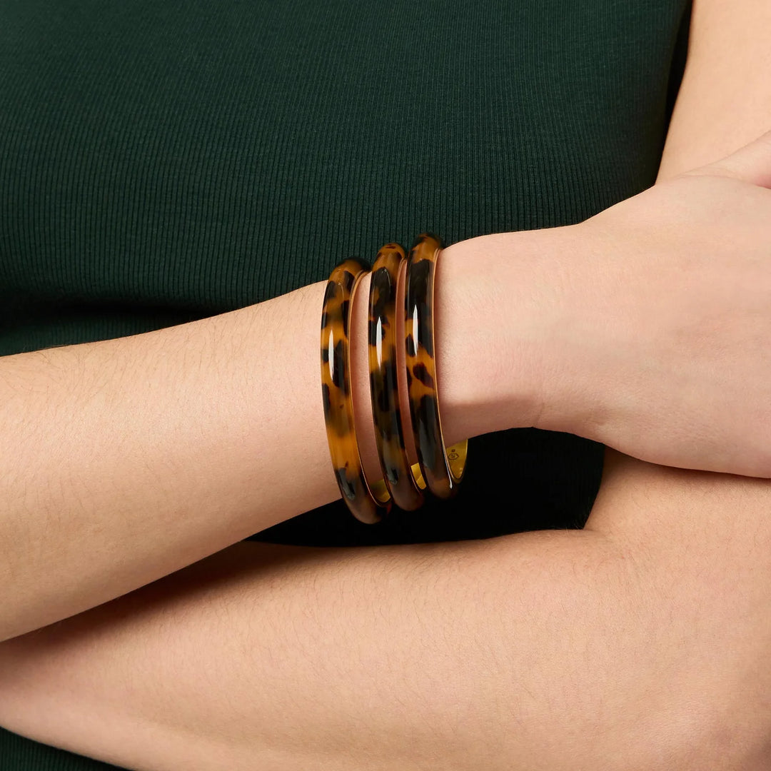 Madison Statement Bangle Tortoiseshell with 24K gold plating; available in S, M, and L sizes.