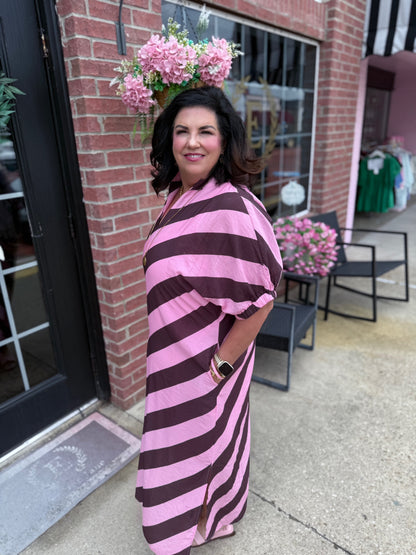 Rosewood Stripe Midi Dress with pink and brown stripes and pockets. Available in sizes XS–XL.