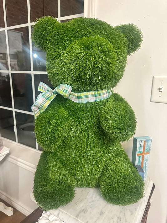 Grass Teddy Bear with green artificial grass and plaid ribbon. Available in small, medium, and large sizes.