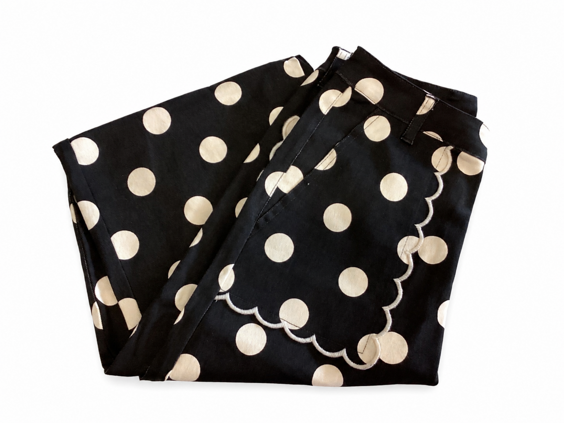 Polka Dot Scalloped Jeans in black with large white polka dots and scalloped pocket edges; available in sizes XS-XL.