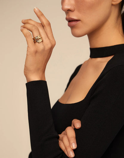 The Multiband Ring is an 18K gold-plated, handmade piece from Spain. Available in sizes 5–9.