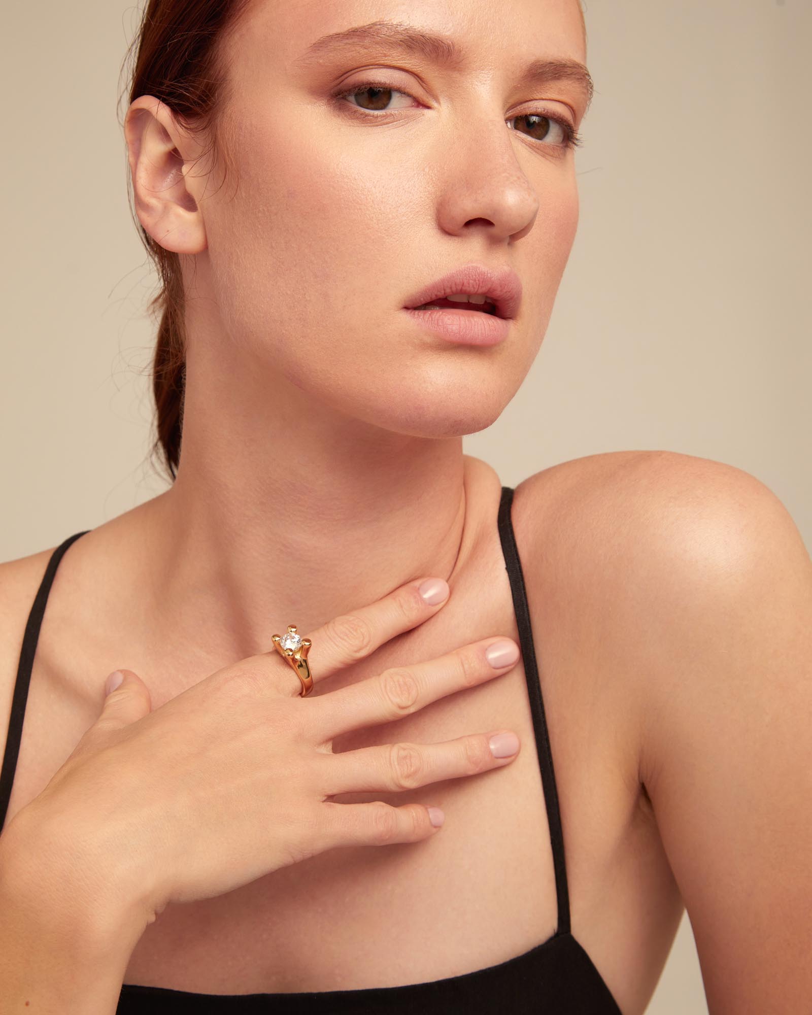 Gold Ring with White Cubic Zirconia shown; available in sizes 5–9.