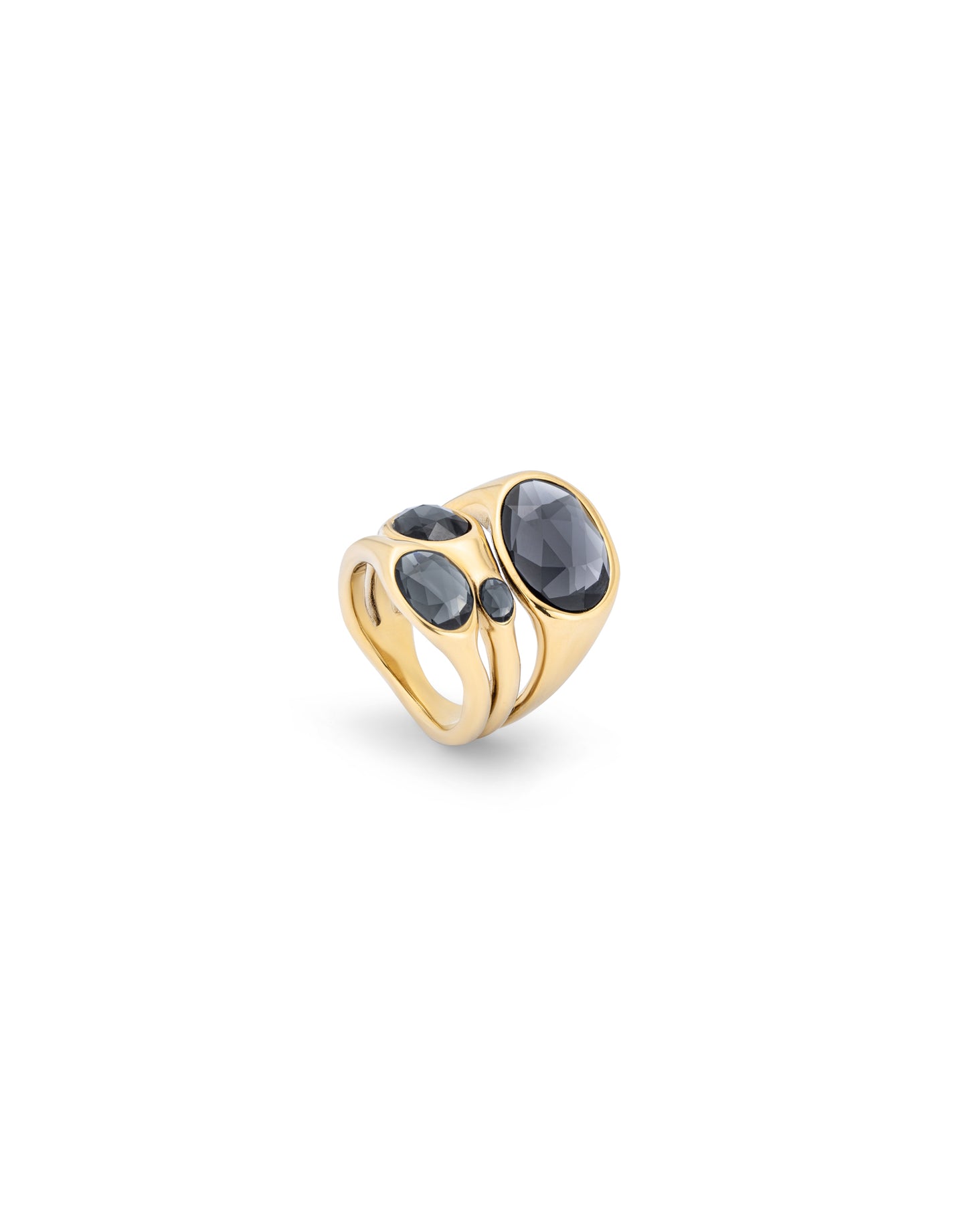 Gold multiband ring from Spain with 18k gold plating, featuring three bands each set with a round black crystal in varying sizes. Available in sizes 6, 7, and 8.