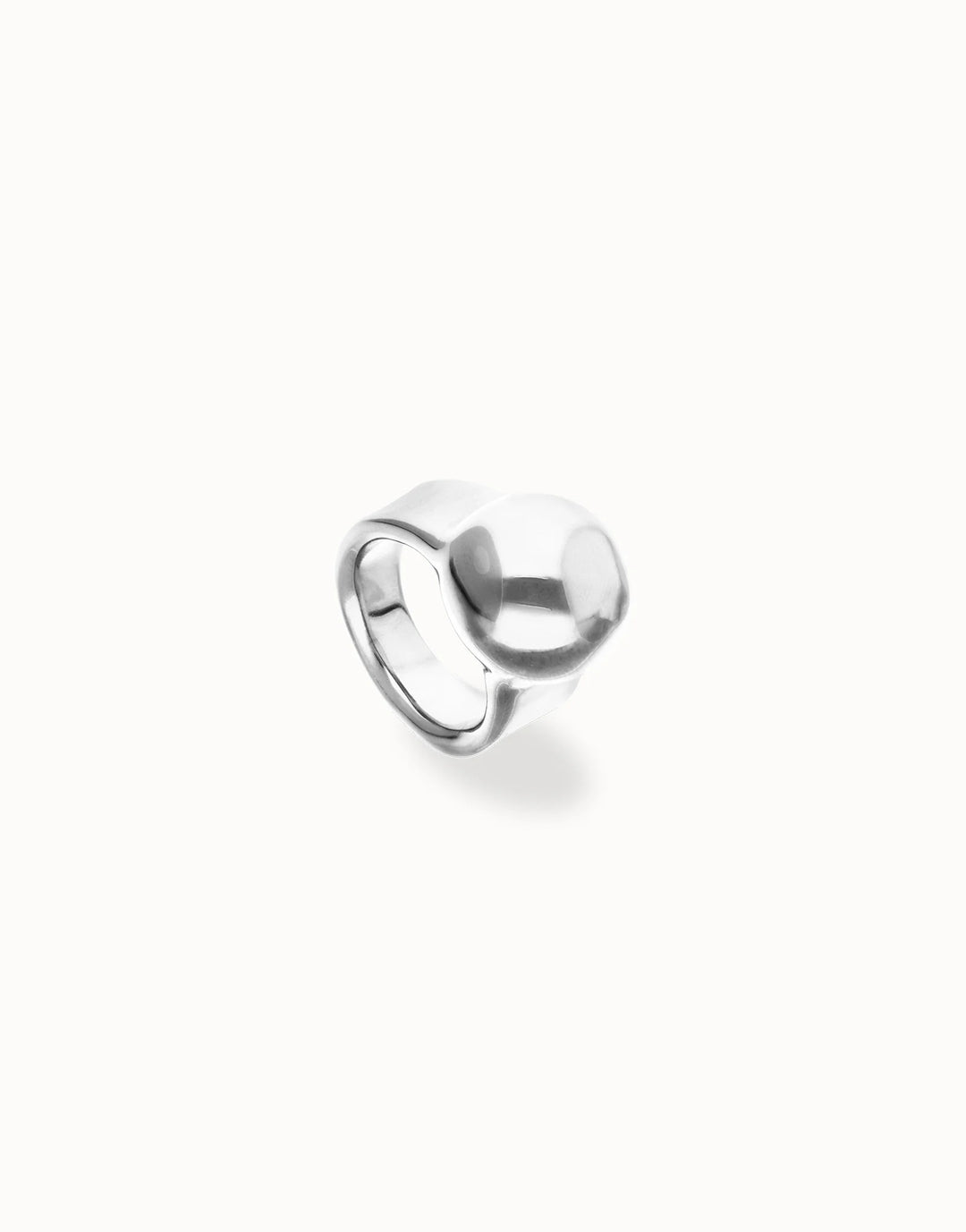 Chunky sterling silver ring with a smooth, asymmetrical sphere-shaped top; available in sizes 6, 7, and 8.